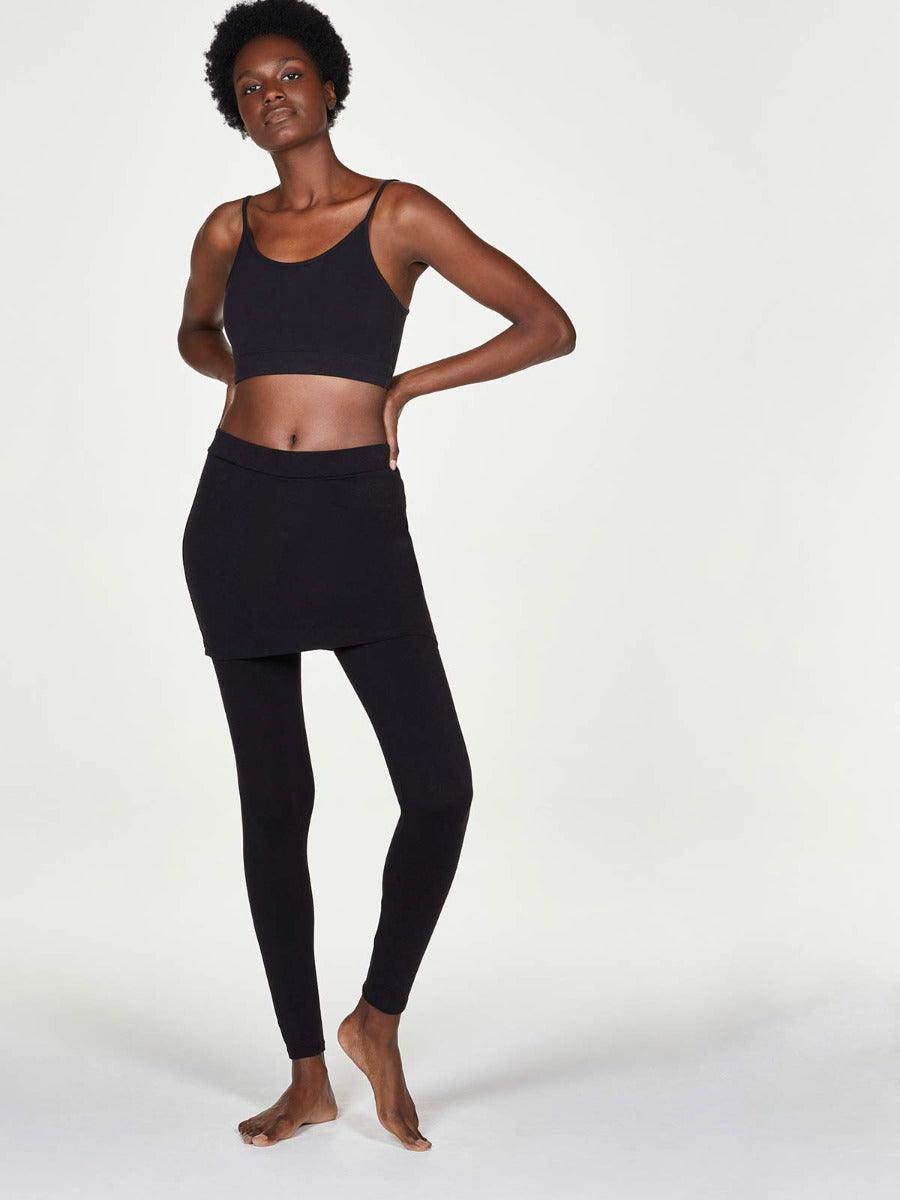 https://www.wearethought.com/cdn/shop/products/wwb3467-black--jay-skirted-bamboo-leggings-in-black-3_2.jpg?v=1705483152&width=900